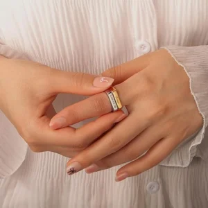 Custom stainless steel rings with personalized engraving. 14k plating options, hypoallergenic, handmade in the US. Perfect gift in a delicate box.