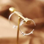 Crafted with S925 silver—high-quality, durable, and safe for sensitive ears. 2 styles: minimalist studs (everyday subtlety) & playful hoops (conversation-starting swing). Lightweight (≈6g each)—comfortable for all-day wear, no ear strain. Sold individually—mix/match for asymmetric style or pick your favorite.