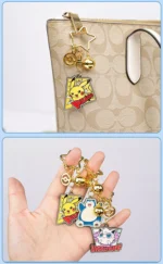 Pokemon Keychain Metal 3pcs Packet 3 Official Pokémon license: Authentic designs of Pikachu, Jigglypuff, Gengar & more (6 styles total). 3pcs per packet: Mix or pick favorite Pokémon; made of durable zinc alloy. Multi-use: Hang on keys/bags; has a bell—shake for mood lifts. Cute & sturdy: metal clasp (anti-drop), adds fun to daily life.
