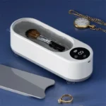 Ultrasonic Glasses Cleaner 2 Ultrasonic Glasses Cleaner – 450ml portable machine. Cleans glasses, jewelry, makeup brushes with tap water. Easy, durable, space-saving.