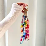 17 cute styles: Choose from fruits, hearts, daisies, letters, and more (e.g., Banana Strawberries, Demon's Eyes). 3 pcs per kit: Lightweight (1.62oz/pc), 8.5 inches long—easy to attach to bags/backpacks. Stylish accessory: Blends Boho-chic with trends, perfect for casual/office/summer looks. Great gift: Chic packaging, ideal for birthdays/anniversaries—loved by fashion fans.